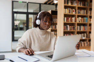 Image of a lady Shopping for Books online - BookBarTT