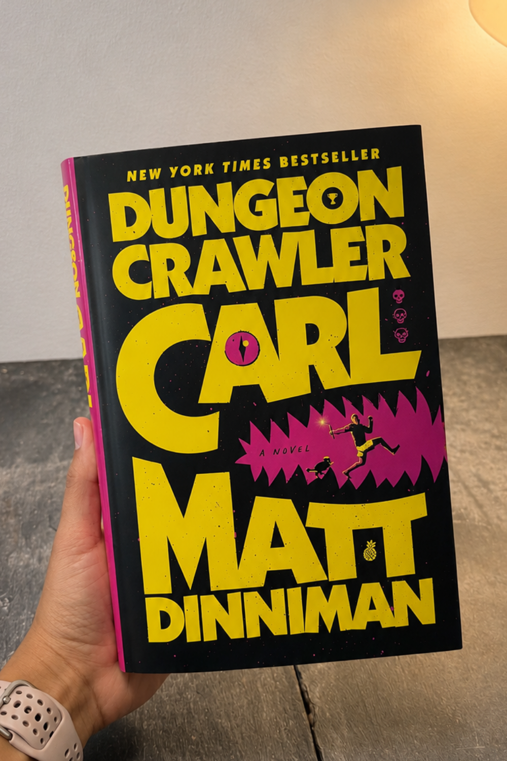 Cover of Dungeon Crawler Carl by Matt Dinniman, a LitRPG fantasy adventure about survival, video game mechanics, and an alien game show available in Trinidad