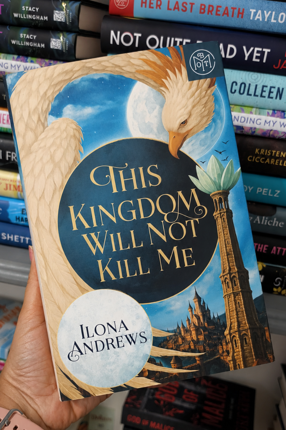 Cover of This Kingdom Will Not Kill Me by Ilona Andrews, a book about portal fantasy, magic, survival, and kingdom politics available in Trinidad.