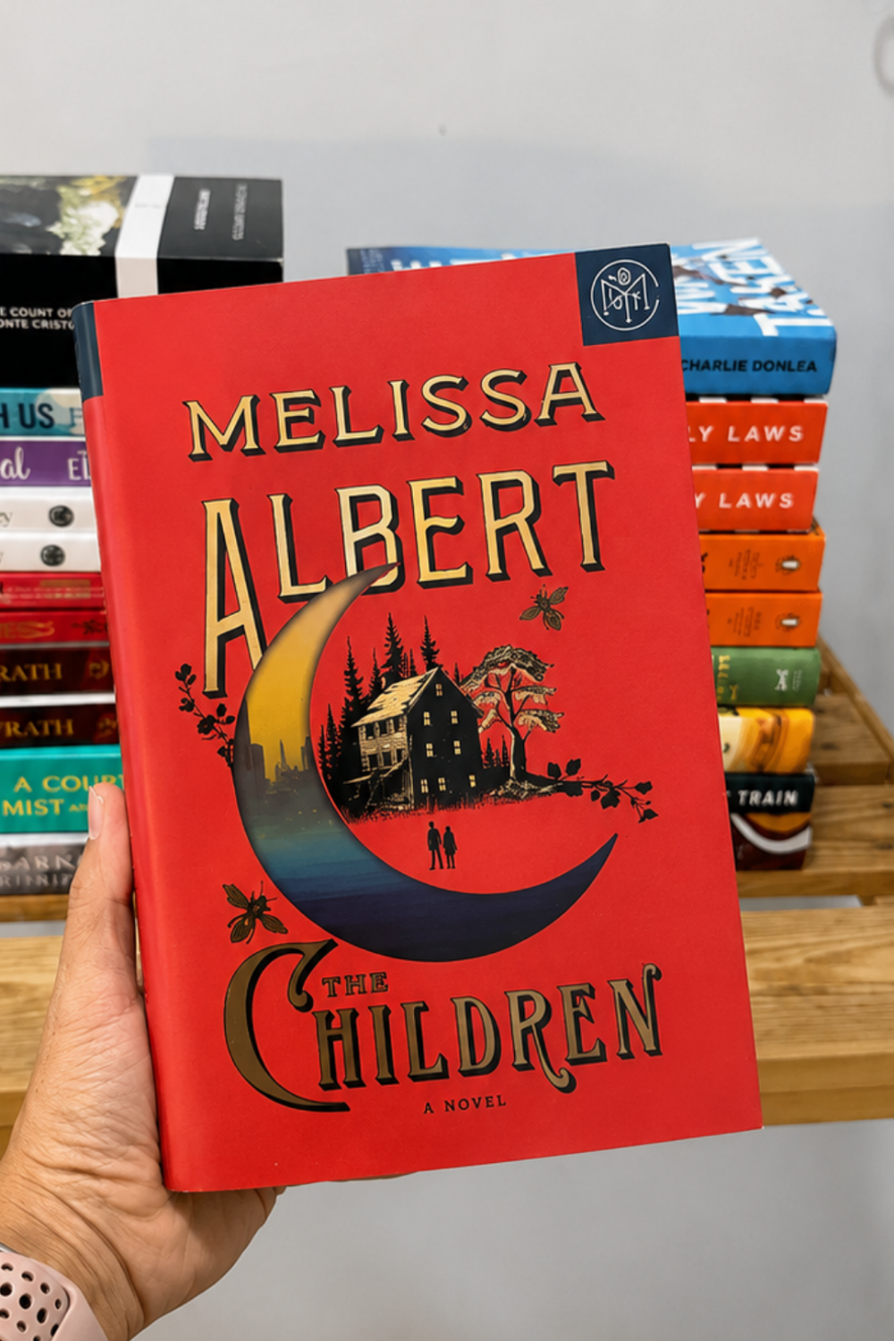 Cover of The Children: A Novel by Melissa Albert, a fantasy book about childhood memory, legacy and magic available in Trinidad.