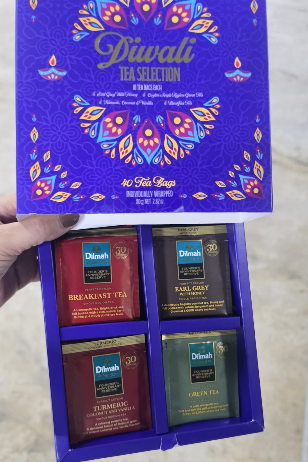 Dilmah Diwali Tea Selection Box with 40 individually wrapped tea bags in four tea varieties.