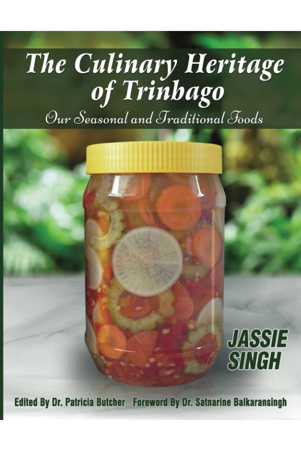 Cover of The Culinary Heritage of Trinbago by JASSIE SINGH, a Trinidad and Tobago cookbook featuring traditional foods, seasonal recipes and food origins, available in Trinidad.
